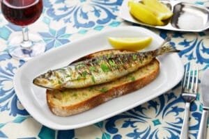 portuguese grilled sardine on toasted bread